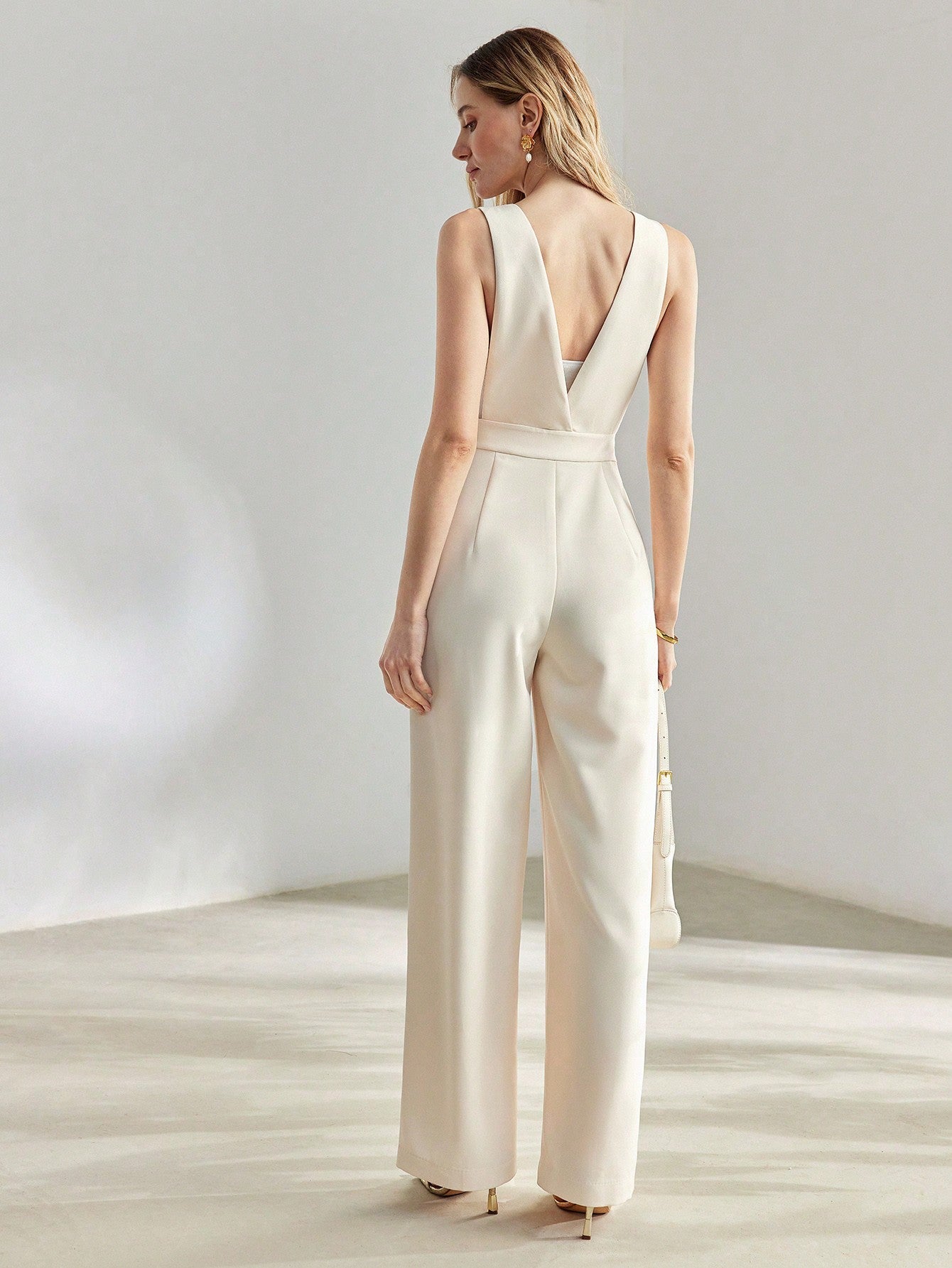 Plunging Neck Seam Front Slant Pocket Jumpsuit 